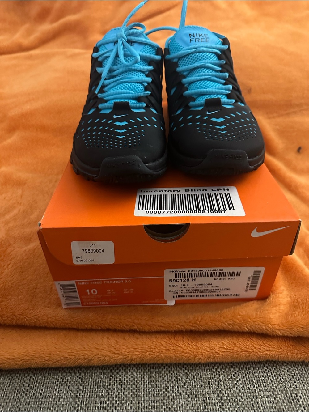 Nike Black Trainers with Bright Blue Accents